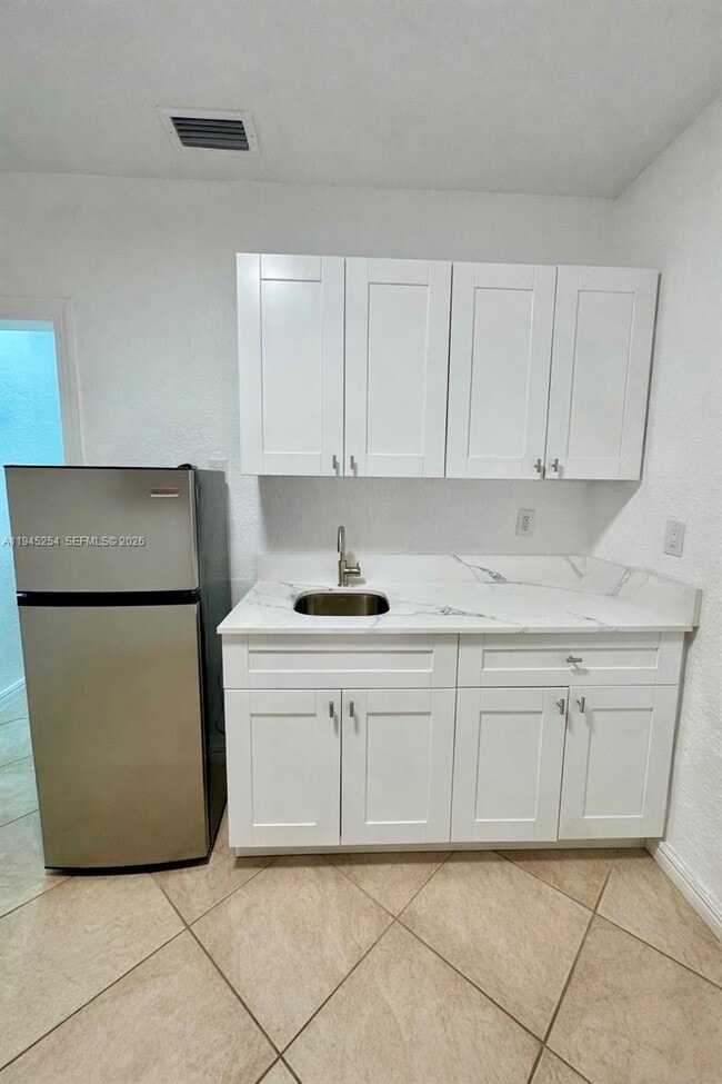 Building Photo - 6541 W 11th Ct Unit 1