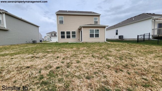 Photo - "Modern Luxury: Spacious 4-Bedroom Home with Open-Concept Design"