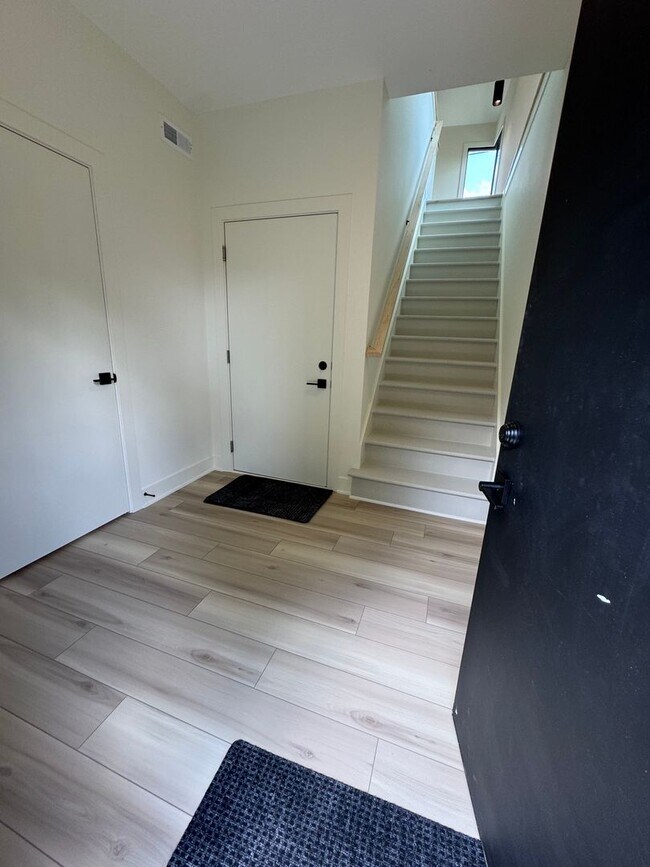 Building Photo - Vaulted Ceilings & Hardwood Floors in This Charming Indianapolis L
