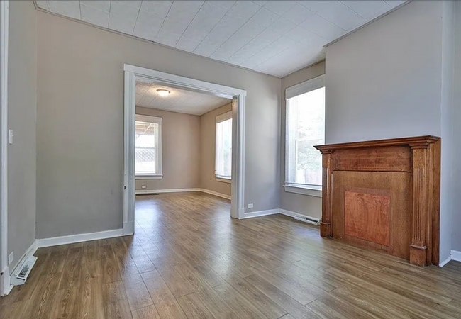 Photo - Bright 4-Bed Home with Fenced Yard, Central HVAC, and 3 Finished Levels