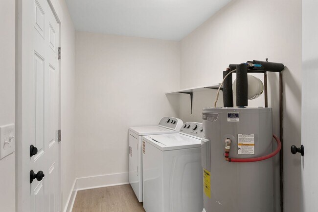 Photo - Available now. Water included. RENOVATED 2 BR/1.5 BA Townhouse in the Heart of James Island!