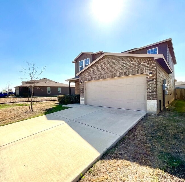 Photo - AVAILABLE NOW- Energy-Efficient 4/3 Home with Solar Panels & Pool Access!