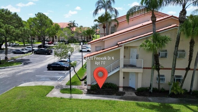 Building Photo - 3420 Pinewalk Dr N Unit 717