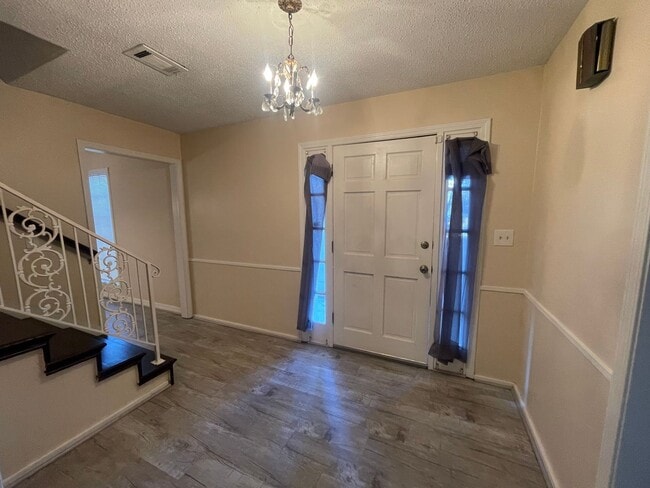 Photo - Lovely Two-Story Brick Home Located In "Western Hills" Off Pines Road