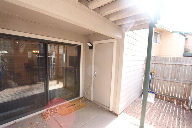 Photo - $300 Move-In Special | Ground-Floor Furnished Condo with Small Fenced Yard
