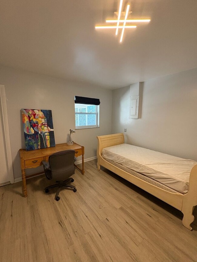 Photo - 3/2 Pool & Patio home in Stuart! Pool / Lawn care included!