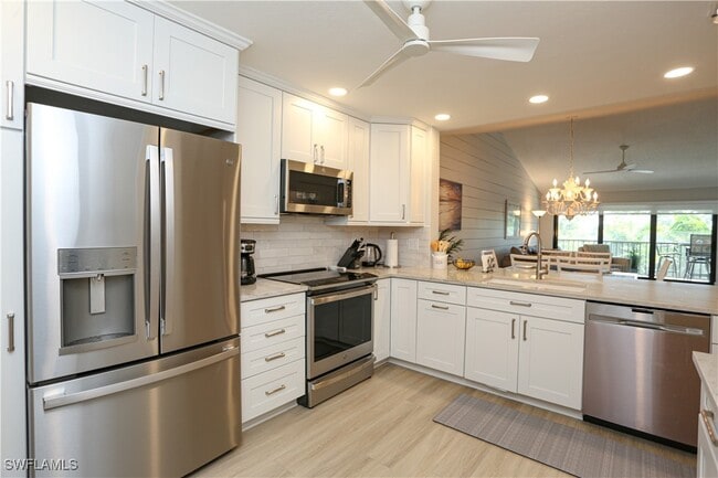 Building Photo - 5733 Deauville Cir Unit G308