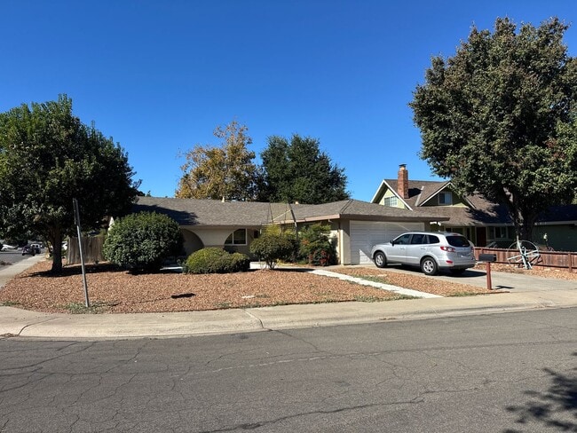 Building Photo - Enjoy the Backyard Pool at This 4-Bedroom ...