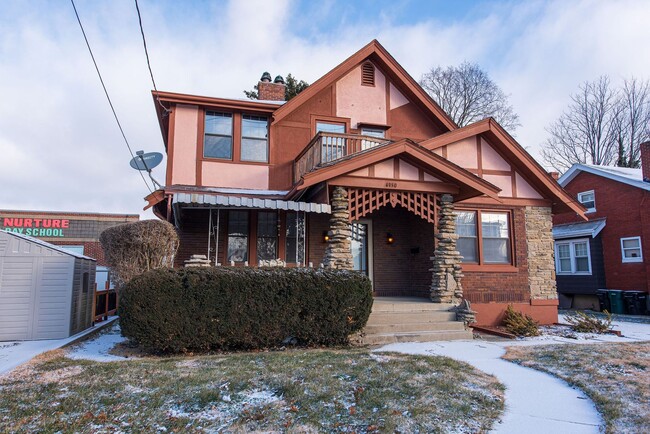 Photo - Beautifully updated Tudor style duplex. Upper unit. Large rooms. 2 balconies, private entry. Fenc... Unit #1 Ferguson Pl 4950