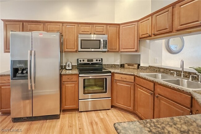 Building Photo - 1300 Misty Pines Cir Unit D204