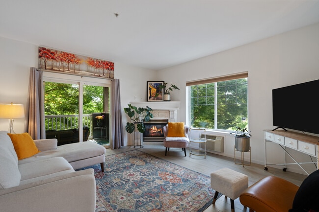 Living Room and Balcony with Park Views - 10800 SE 17th Cir Rental