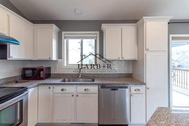 Photo - Updated 4 Bedroom Home with Remodeled Kitchen & Tiered Deck