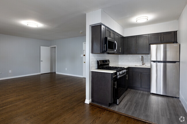 2BR, 1BA - 900SF Living Room and Kitchen - Barry Court Apartments
