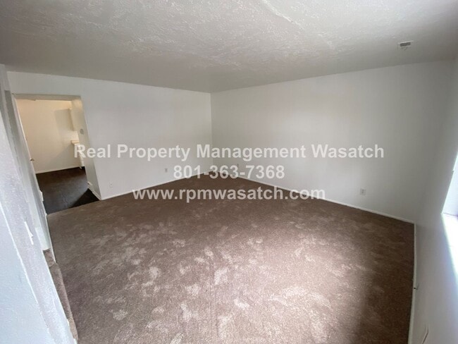 Photo - Check Out This Charming 3 Bedroom 1.5 Bathroom Condo in Midvale Ut!