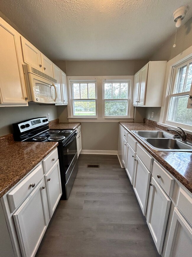 Photo - Charming 2 Bed, 1 Bath, Attached Carport and Spacious Yard!