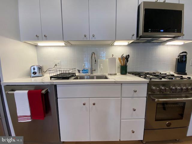 Building Photo - 1775 Swann St NW Unit 102 Rental