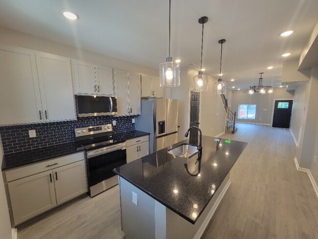 Photo - 1409 N Patterson Park Ave Townhome