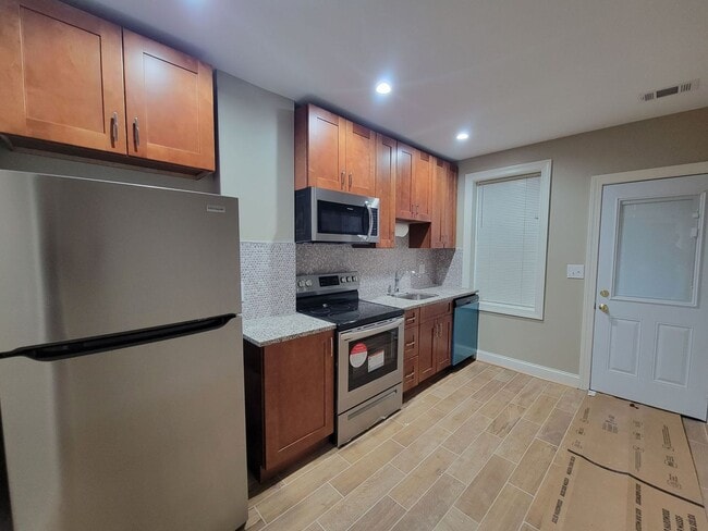 Building Photo - 3203 Guilford Ave Unit B