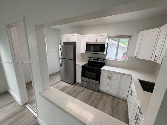 Photo - 10417 NW 6th Ave Unit Front
