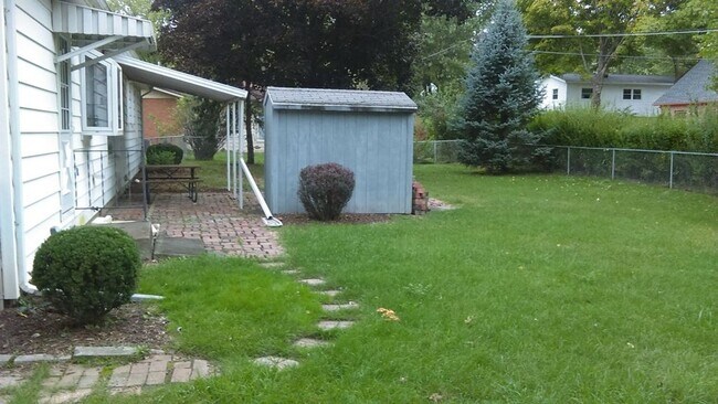 Photo - Charming Ranch Home with Fenced Yard and 2-Car Garage