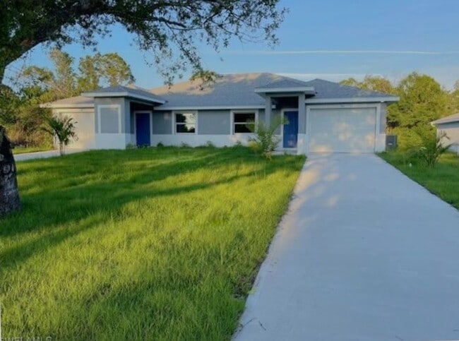 Building Photo - 2/2/1+DEN - GREAT LOCATION IN LEHIGH ACRES- BELL BLVD