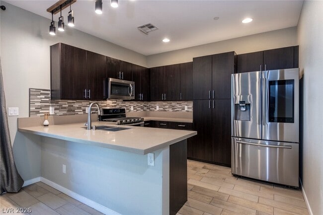 Building Photo - 11257 Rainbow Peak Ave Unit 210