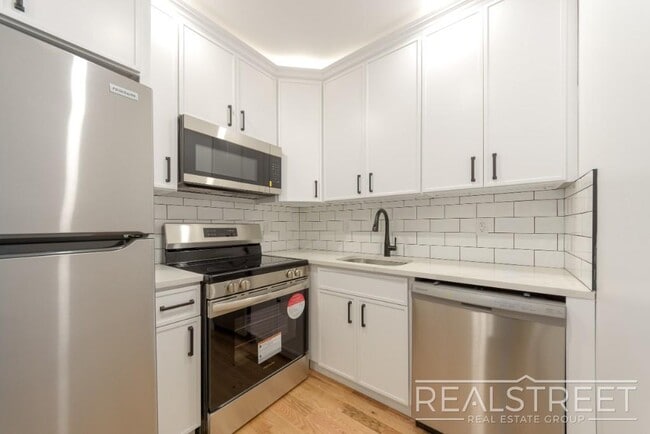 Photo - Modern New Construction 1-Bedroom Apartment with Premium Amenities – Prime Location Unit 2A