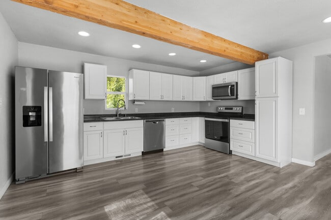 Photo - 3265 US Highway 2 W Unit Upper