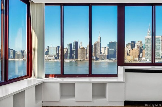 Building Photo - 4-74-74 48th Ave Unit 19A