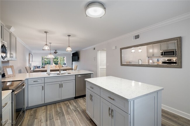 Building Photo - 3021 Sandpiper Bay Cir Unit E106 Rental