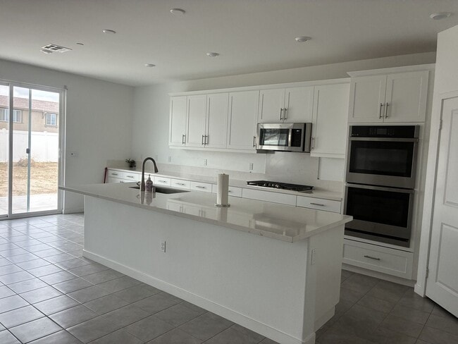 Photo - Spacious 4-Bedroom Single-Story Home with Large Backyard