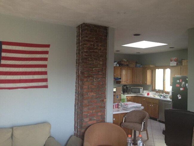 Photo - Top-Floor 4BR w/ Balcony | Mission Hill | Student OK | 9/1