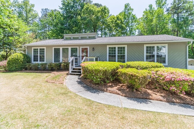 Photo - This beautifully updated Marietta, GA home offers 3 bedrooms and 2.5 bathrooms with an open floor...