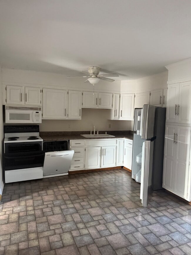 Photo - 2 bedroom and 2.5 bathroom townhome available for immediate move in.