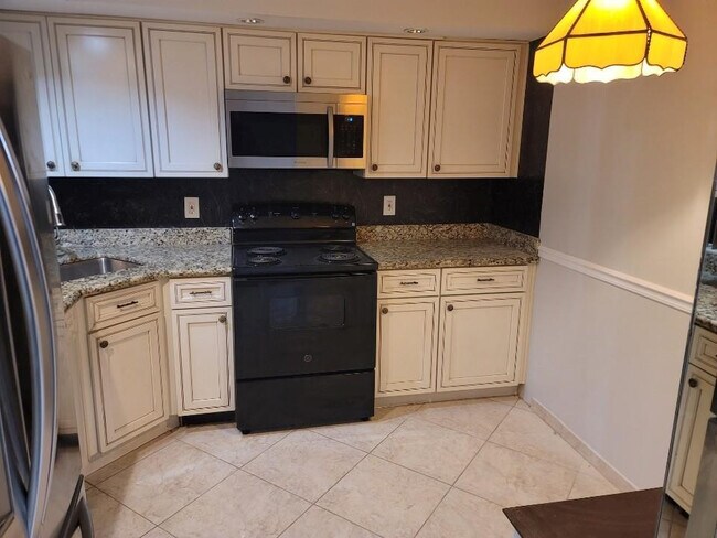 Building Photo - 8657 Boca Glades Blvd