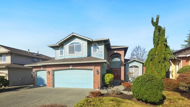 Photo - Spacious Updated 4 Bedroom Home with 3 Car Garage