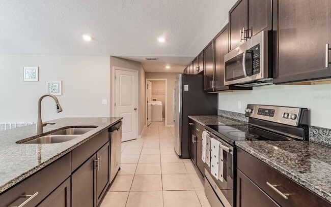 Photo - "Discover Spacious Comfort: 4-Bed, 2-Bath Gem in Riverview!"