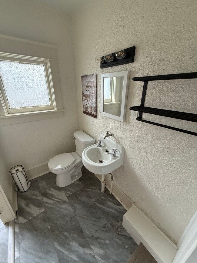New floors in shared bathroom - 428 S Main St Unit 2