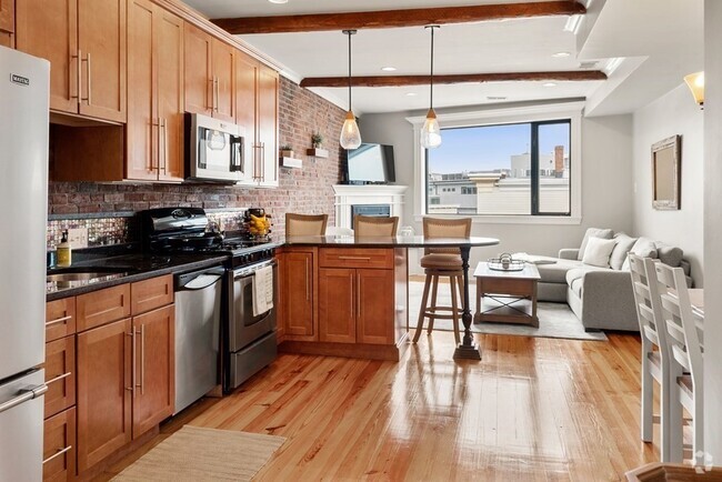 Building Photo - 410 E 3rd St Unit 2 Rental