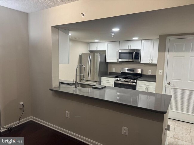 Building Photo - 11710 Old Georgetown Rd Unit 1007 Rental