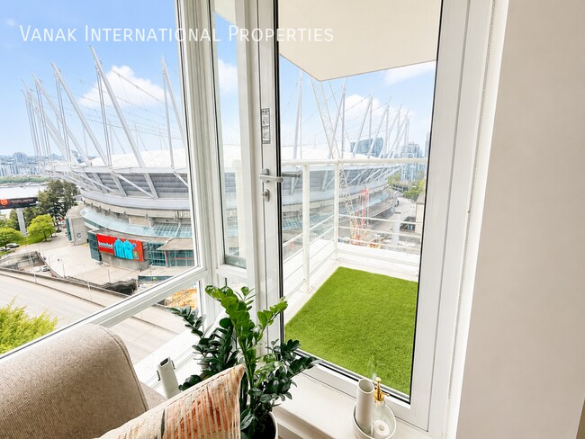 Photo - Bright 1 Bed + Den + Solarium | Pool, Gym & Rooftop Patio
