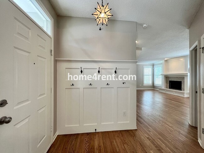 Photo - Updated Kitchen, Large Two Tiered Deck, Finished Basement in Blue Valley Schools!
