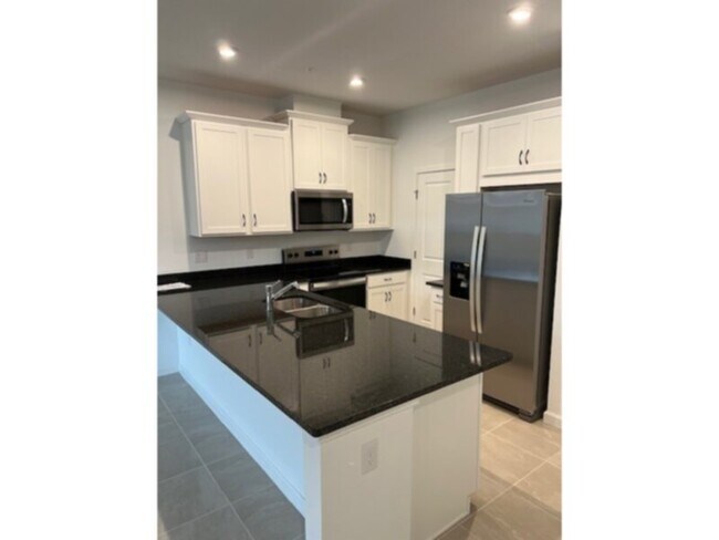 Photo - 3 bed 2.5 bath townhome at Gardenia Reserve