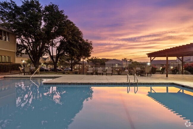 Pool-Side View at Chevy Chase in Austin, TX 78752 - Chevy Chase Rental