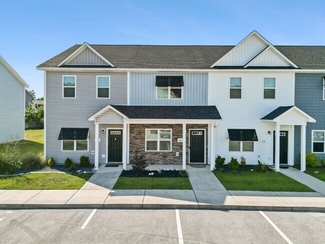 Photo - Available Now! Enjoy low-maintenance coastal living in this beautiful 2-bedroom, 2.5-bath townhom...