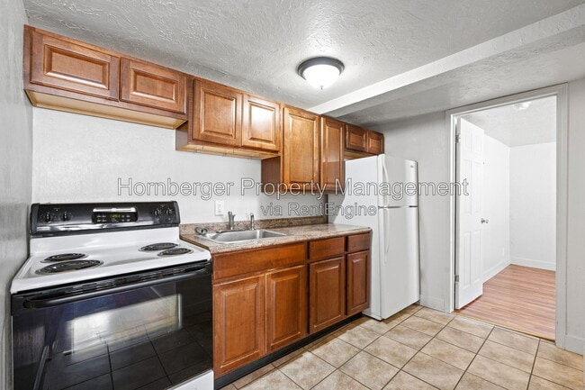 Building Photo - 1108 W 12th Ave Unit 3