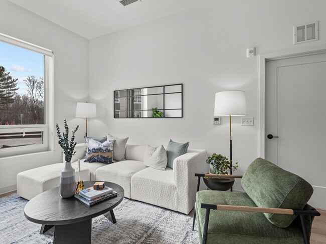 Bright apartment living room at The Elmwood