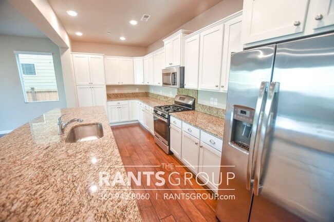 Photo - Modern and well designed 4 bd/ 2.5 bath home available mid-April!