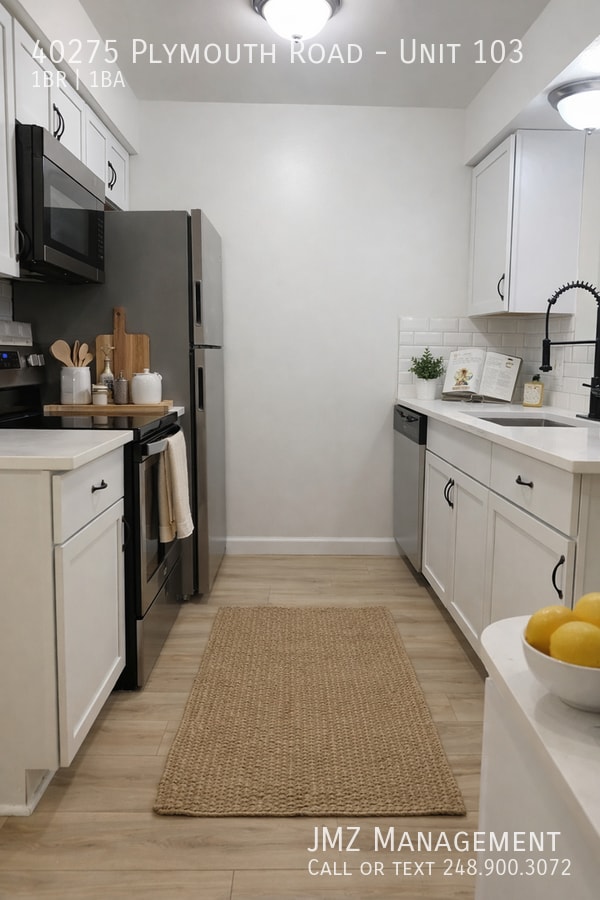 Building Photo - 40275 Plymouth Rd Unit 103