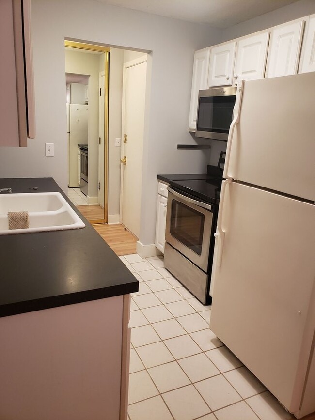 Building Photo - Comfortable 2-Bedroom Condo Near Lake Minnetonka – Private Deck & Resort-Style Amenities Unit 107